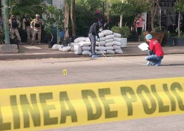 Balean a conductor en la calle 200