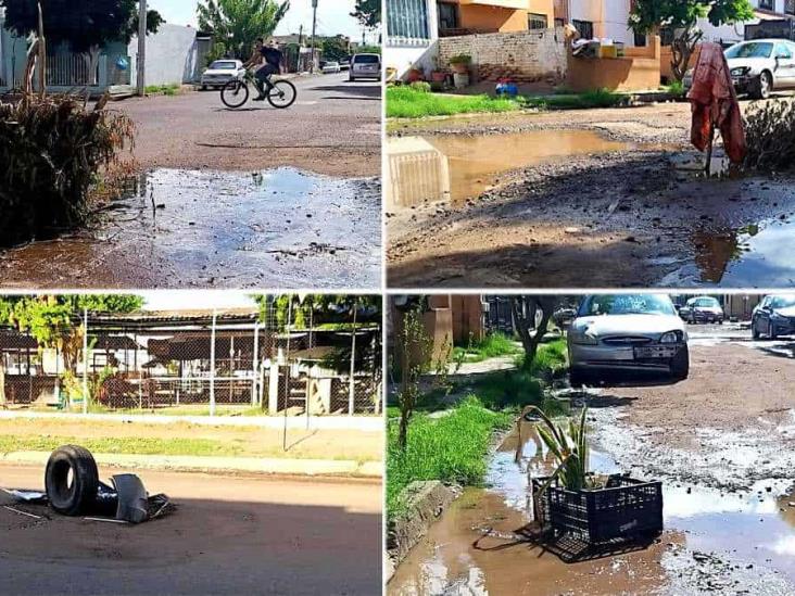 Socavones y baches “adornan” Ciudad Obregón Socavones y baches “adornan” Ciudad Obregón