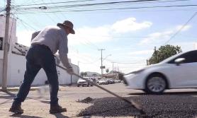 Si el bache no se arregla, se regresa el monto del predial Si el bache no se arregla, se regresa el monto del predial