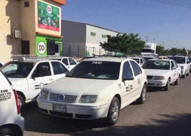 Piden taxistas se siga trabajando en bacheo