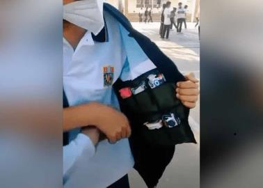 VIDEO: Niño convierte su uniforme escolar en tiendita móvil