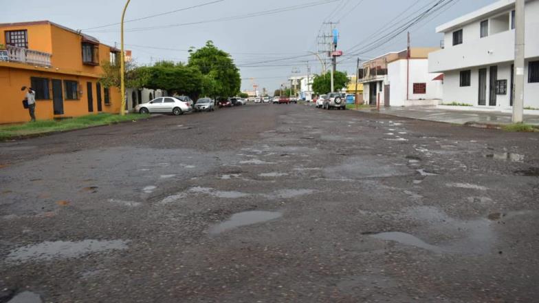 Encharcamientos y profundidad de baches causan las lluvias