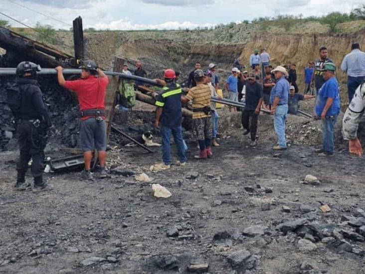 Logran rescatar a 5 mineros atrapados Logran rescatar a 5 mineros atrapados
