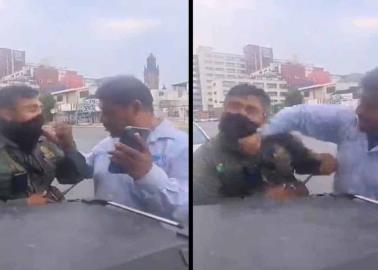 VIDEO: Empleado de Telmex tunde a golpes a oficial de Movilidad