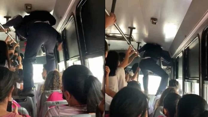 VIDEO. Brinca sobre la gente sentada para bajar del camión VIDEO. Brinca sobre la gente sentada para bajar del camión