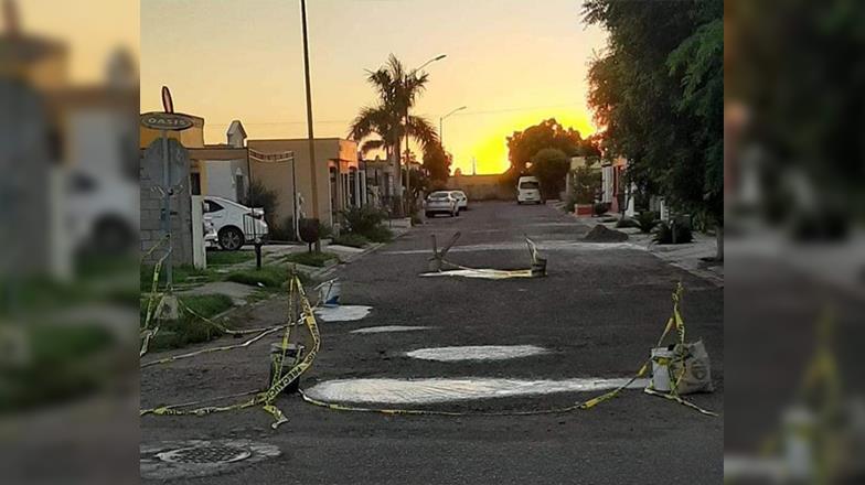 Vecinos tapan baches Vecinos tapan baches