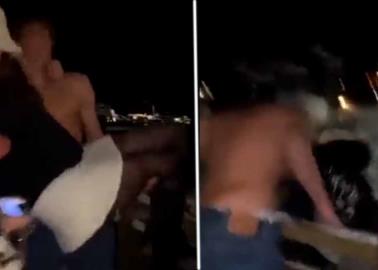 VIDEO. La alzan en brazos para la foto y la lanzan de tercer piso