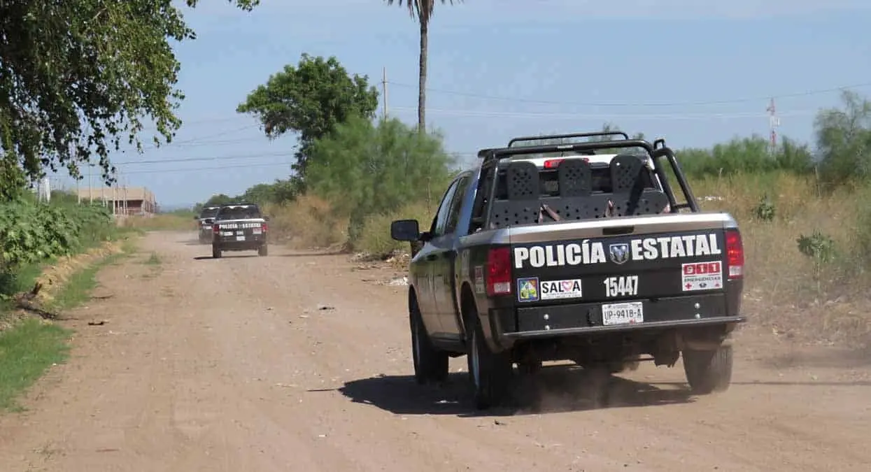 Hallan cadáver de mujer semienterrado