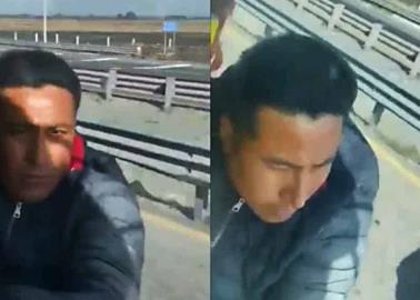 VIDEO. Intenta robar tráiler y queda colgando en la puerta