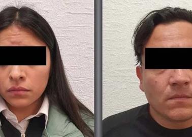 Pareja asesina a sus padres y los entierran en su casa