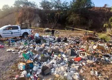 Hallan cinco cadáveres en basurero de Michoacán