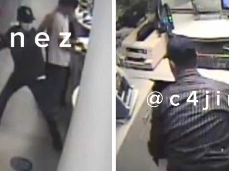 VIDEO | Sujeto asalta un banco con un marro VIDEO | Sujeto asalta un banco con un marro