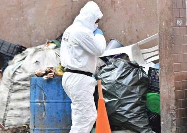 Localizan el cuerpo de una mujer dentro de un tambo