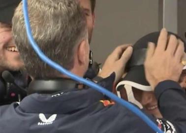 Christian Horner tapa logo de Ferrari a invitada a los garajes de Red Bull