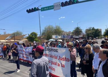 Paros de STAUS y STEUS podrían empalmarse; académicos bloquean calle en Hermosillo