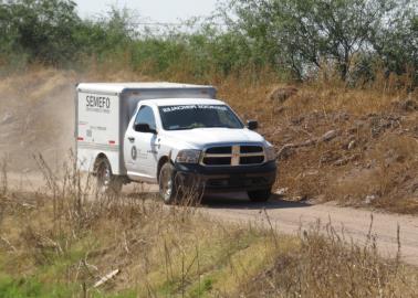 Encuentran cadáver semienterrado