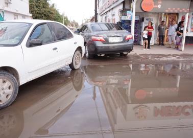 Cierran calles en Cajeme por drenajes colapsados; Oomapasc responde