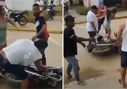 VIDEO | Tipo golpea a su esposa embarazada y unos jóvenes le dan una paliza