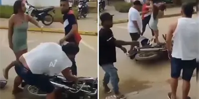 VIDEO | Tipo golpea a su esposa embarazada y unos jóvenes le dan una paliza