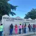 Padres toman escuela en la 410 temen brote de dengue