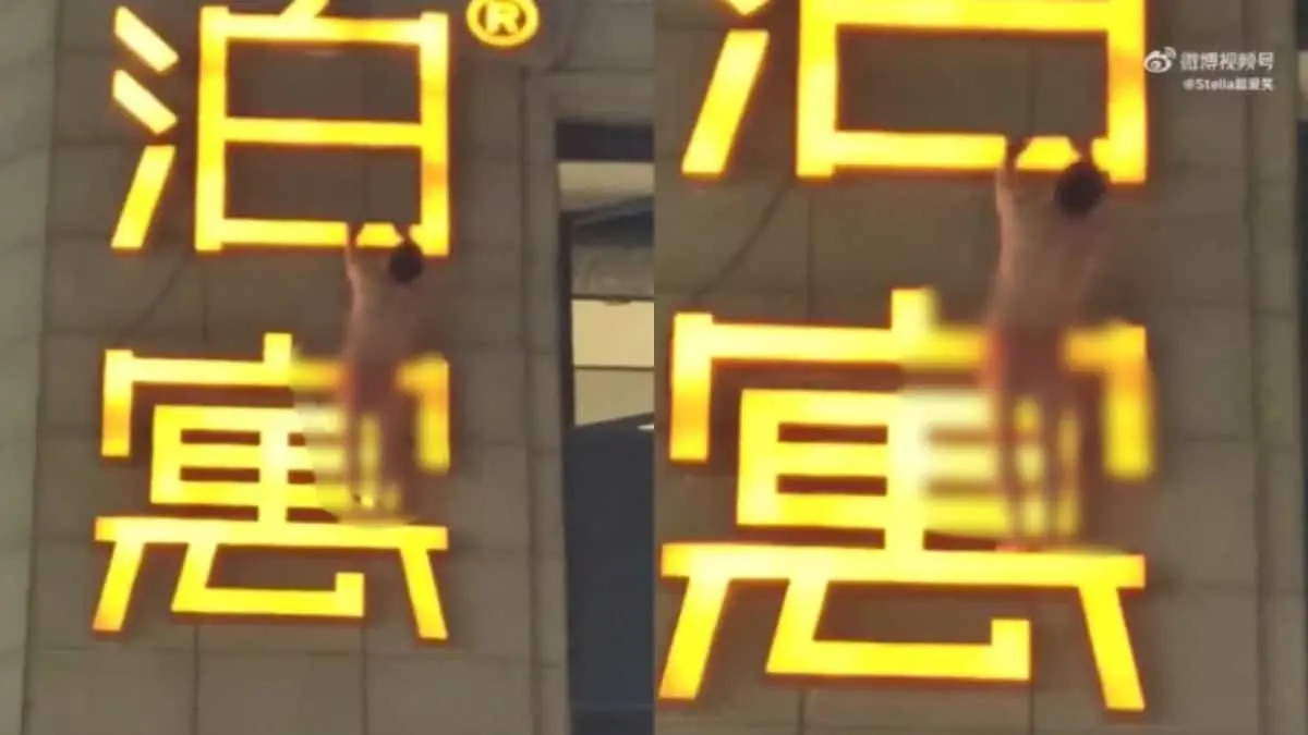 VIDEO | &iexcl;Misi&oacute;n imposible! Infiel queda colgado de un letrero mientras intenta escapar