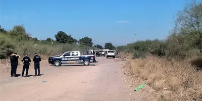 Intensa movilizaci&oacute;n policial tras hallazgo de cuerpo en terreno bald&iacute;o