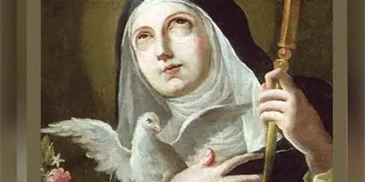Santoral de hoy, 10 de febrero: Santa Escol&aacute;stica, patrona de las monjas, representada por una paloma